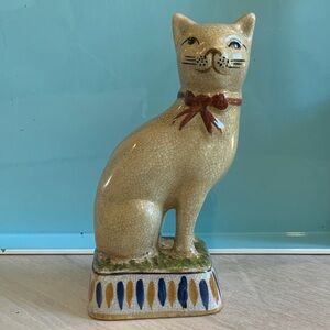 Cream Crackle Ceramic Cat Figurine with Red Bow Accent